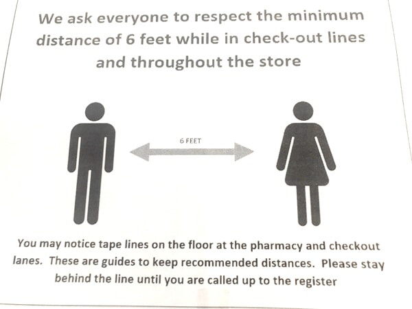 An image of a social distancing sign.
